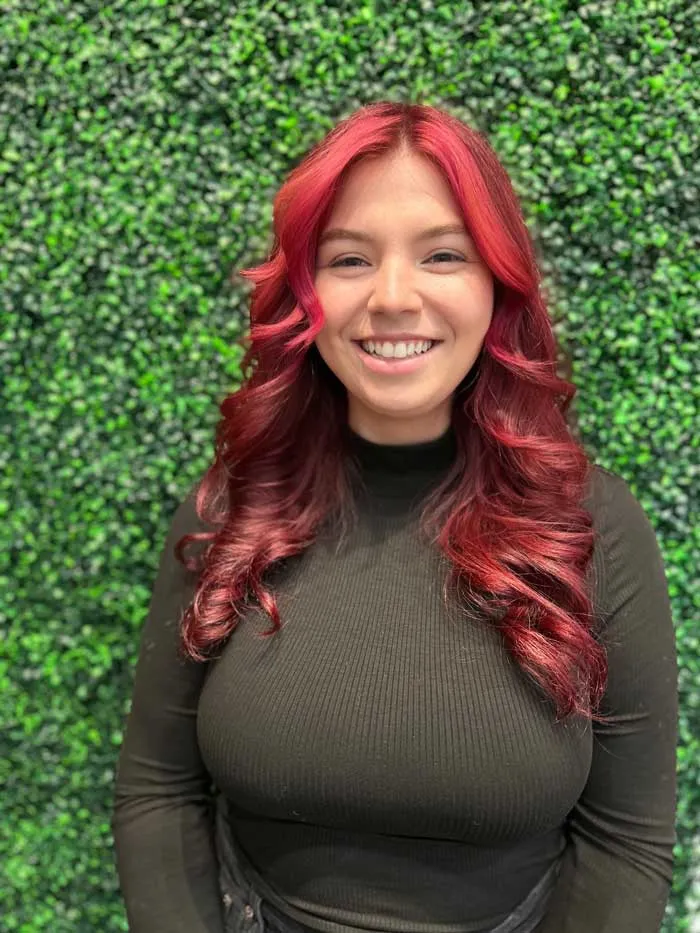 Escape Salon Stylist - Holly specializes in crafting stunning Blonde looks, vibrant Vivid/Fantasy Colors, and flawless Extensions