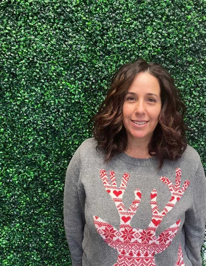 Hairstylist Jenn from Escape Salon, specializes in Curly Hair, Tape in Extensions and Highlighting.