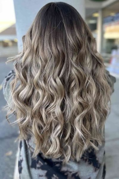 Hair extensions salon service at Escape in Pompton Plains, NJ. Our salon is located near Wayne